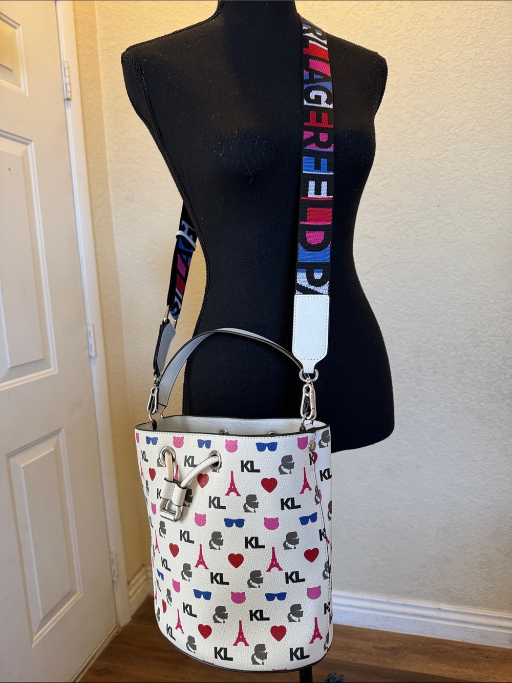 Karl Lagerfeld White Bucket Bag with Multicolor Logo Strap and Heart Print